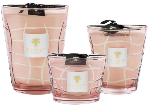 Three Baobab Waves Malibu candles in pink glass holders with grid patterns, displayed in varying sizes as decorative candles.