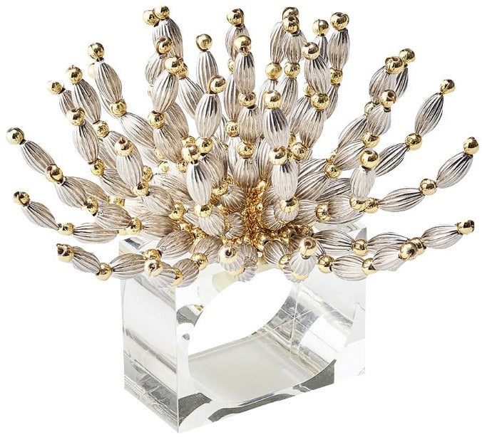 The Kim Seybert Bead Burst Silver/Gold Napkin Ring features a clear base with gold and silver textured beads, ideal for elegant occasions.