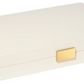 AERIN's Lacquer Backgammon Set in Cream is a closed rectangular box with a gold clasp and sleek lacquer finish—perfect for elegant game storage. Photographed on a white background.