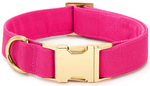The Foggy Dog Fabric Dog Collar features a chic pink design with gold hardware, including a sturdy buckle and D-ring, displayed against a white background.