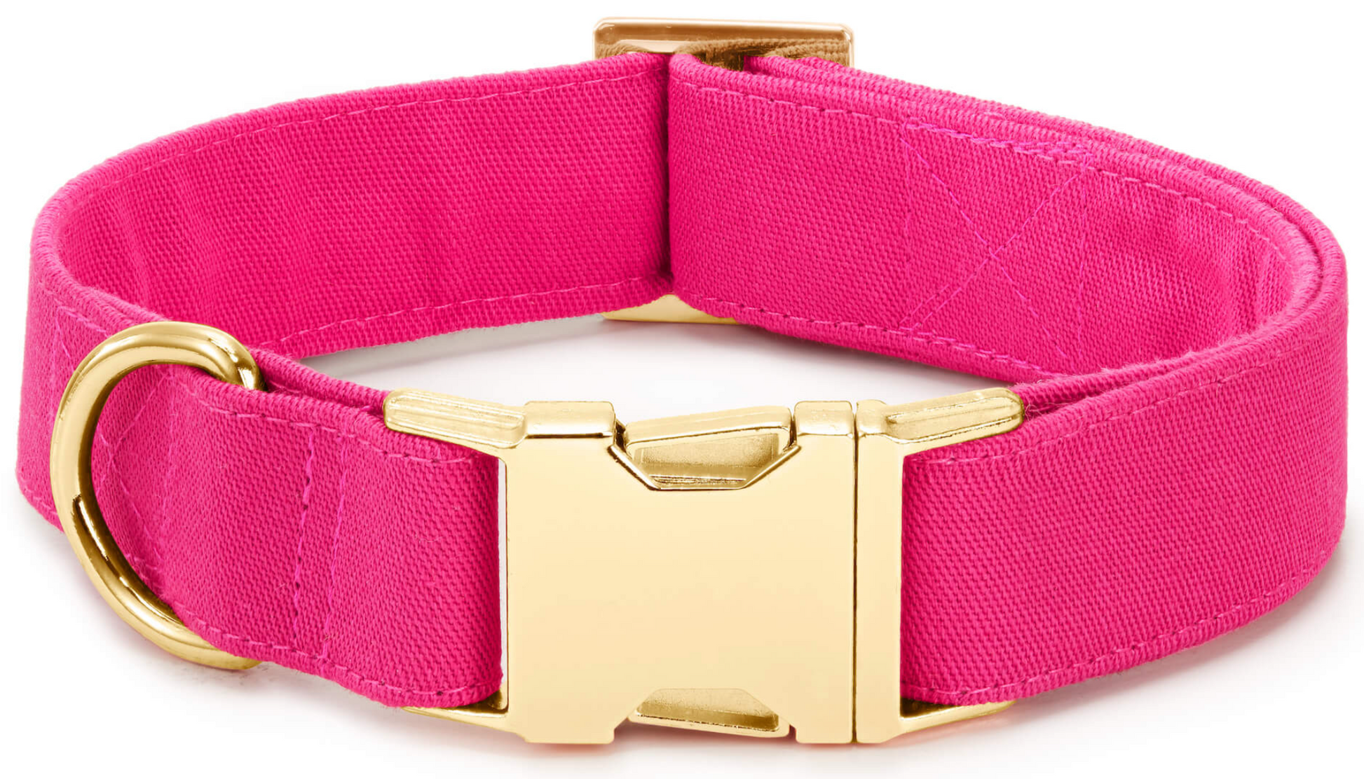 The Foggy Dog Fabric Dog Collar features a chic pink design with gold hardware, including a sturdy buckle and D-ring, displayed against a white background.