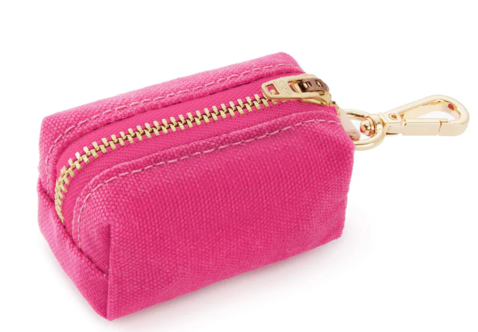 The Foggy Dog Dog Waste Bag Dispenser is a compact pink fabric pouch with a gold zipper, matching clasp, and leash clip—ideal for carrying eco-friendly poop bags in style.