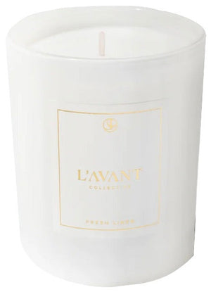 The L'Avant Collective Candle Fresh Linen White features a clean Fresh Linen scent in a white soy coconut wax blend and comes in a glass holder.