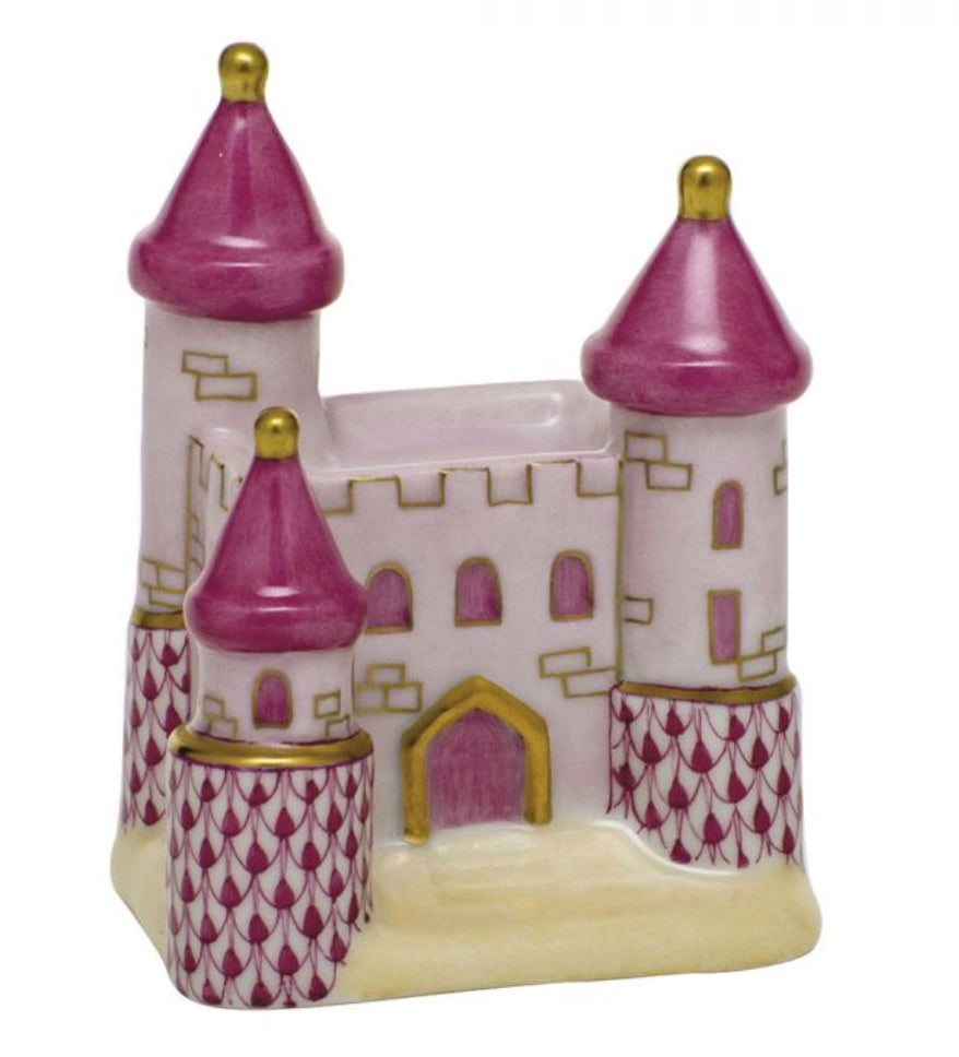 The Herend Castle by Herend is a ceramic figurine with pink towers, gold accents, a central entrance, and whimsical hand-painted designs for artistic appeal.