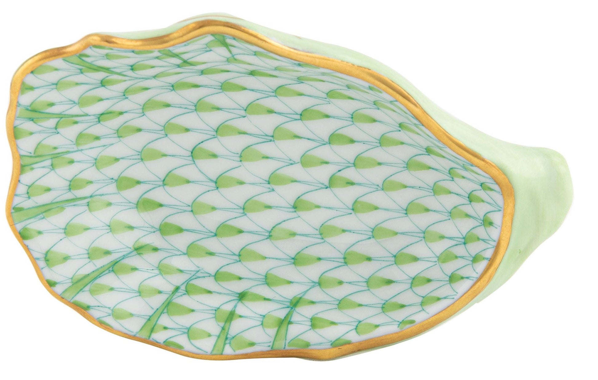 The Herend Oyster Shell is a ceramic dish shaped like a shell, hand painted in green and turquoise scale patterns, and finished with an elegant gold rim.