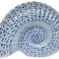 The Herend Ammonite Nautilus is a ceramic sculpture of a spiral seashell with hand-painted blue and white geometric patterns, perfect for artistic appreciation.