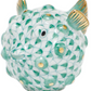The Herend Puffer Fish is a ceramic figurine featuring a green scale pattern, gold accents on fins and spikes, and a glossy finish, inspired by classic hand-painted Herend porcelain designs.