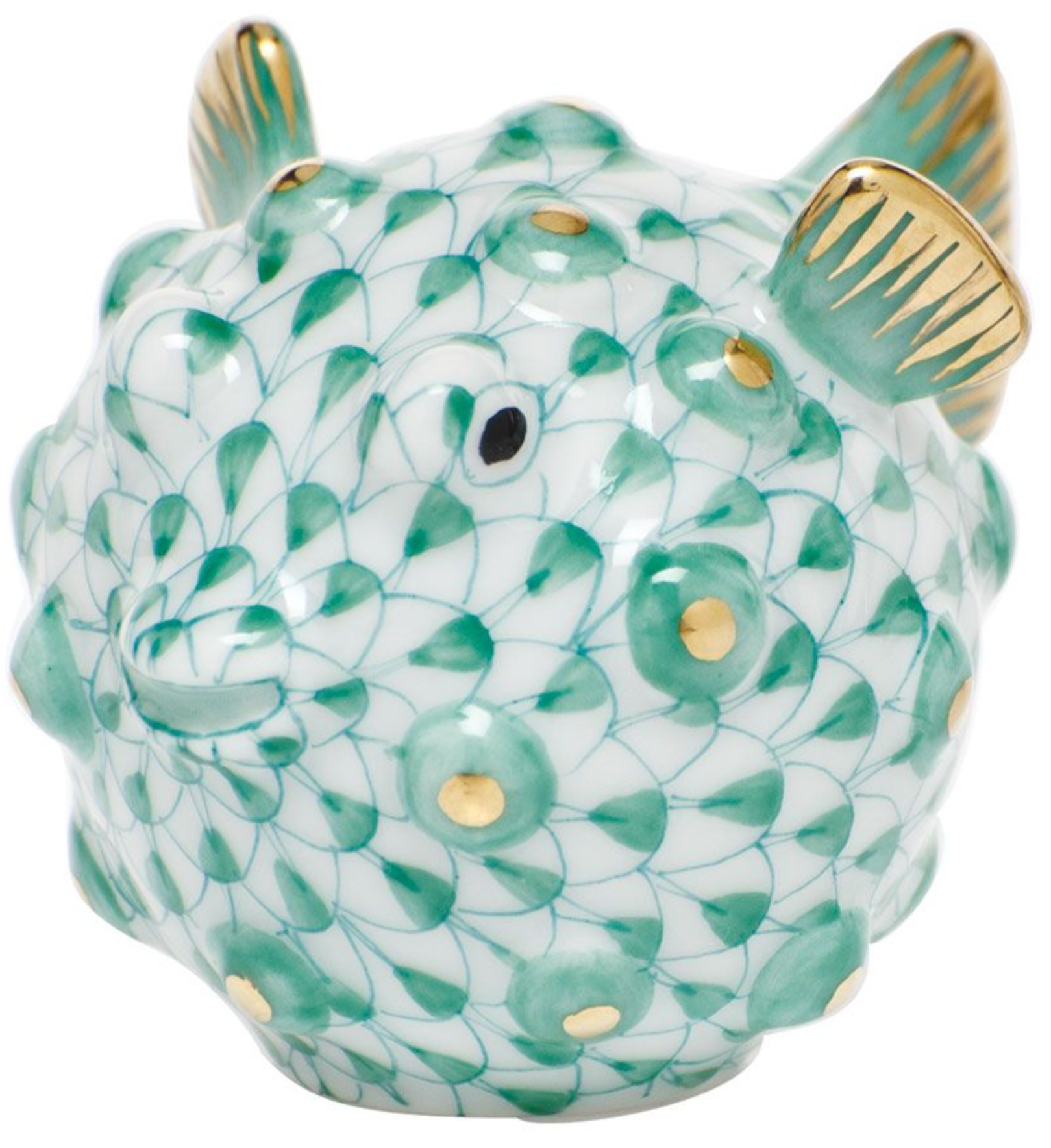 The Herend Puffer Fish is a ceramic figurine featuring a green scale pattern, gold accents on fins and spikes, and a glossy finish, inspired by classic hand-painted Herend porcelain designs.