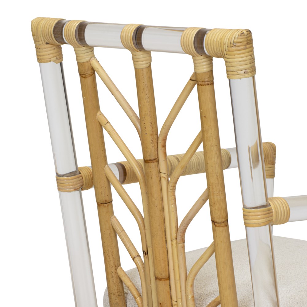 A close-up of the backrest on Selamat's Acrylic and Rattan Arm Chair, showcasing its woven bamboo and clear acrylic tubes. The seat is cushioned with light Kravet Crypton Boucle Fabric.