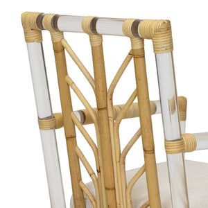 A close-up of the backrest on Selamat's Acrylic and Rattan Arm Chair, showcasing its woven bamboo and clear acrylic tubes. The seat is cushioned with light Kravet Crypton Boucle Fabric.