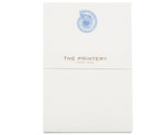 The Nautilus Notepad by Printery features a bone white pad with a blue Nautilus graphic at the top and "THE PRINTERY OYSTER BAY · NEW YORK" in gold at the center. Includes 50 sheets.