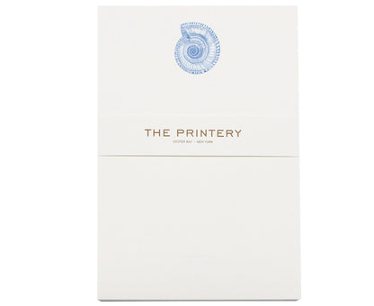 The Nautilus Notepad by Printery features a bone white pad with a blue Nautilus graphic at the top and "THE PRINTERY OYSTER BAY · NEW YORK" in gold at the center. Includes 50 sheets.