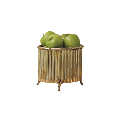 A Small Brass Corrugated Bamboo Cachepot by Global Views holds four green apples against a plain white background.