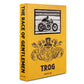 A book titled "The Race of Gentlemen" by Assouline, with a vintage cars racing image on its cover, strongly reflecting American hot rod culture.