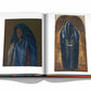 An open book displays two paintings of individuals in traditional attire, characterized by dark, muted tones and evocative of Avant-Garde Orientalist art, much like those featured in Assouline's "Uzbekistan: Avant-Garde Orientalists.