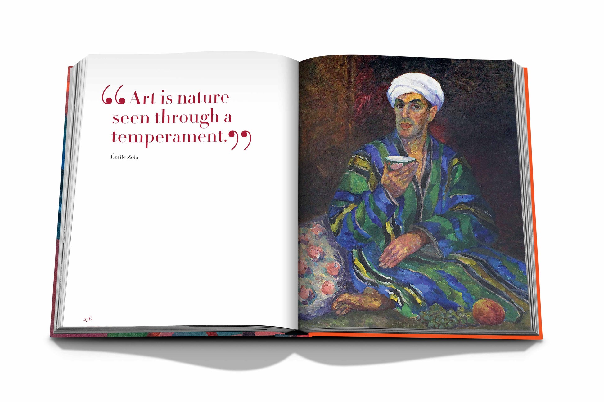 An open book from Assouline's "Uzbekistan: Avant-Garde Orientalists" reveals a quote on the left page, while the right showcases a vibrant painting reminiscent of Russian avant-garde art, depicting a person in colorful attire holding a bowl.