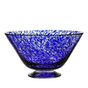 The Blue Vanessa Bowl by William Yeoward Crystal is a handmade glass bowl in Mediterranean blue with white speckles, featuring a wide rim and a small round pedestal base, shown against a white background.