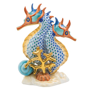 The Herend Reserve Collection Seahorses, Multicolor figurine features two colorful seahorses with blue and green scales, gold accents, coral details, and a sandy base—all exquisitely hand painted.