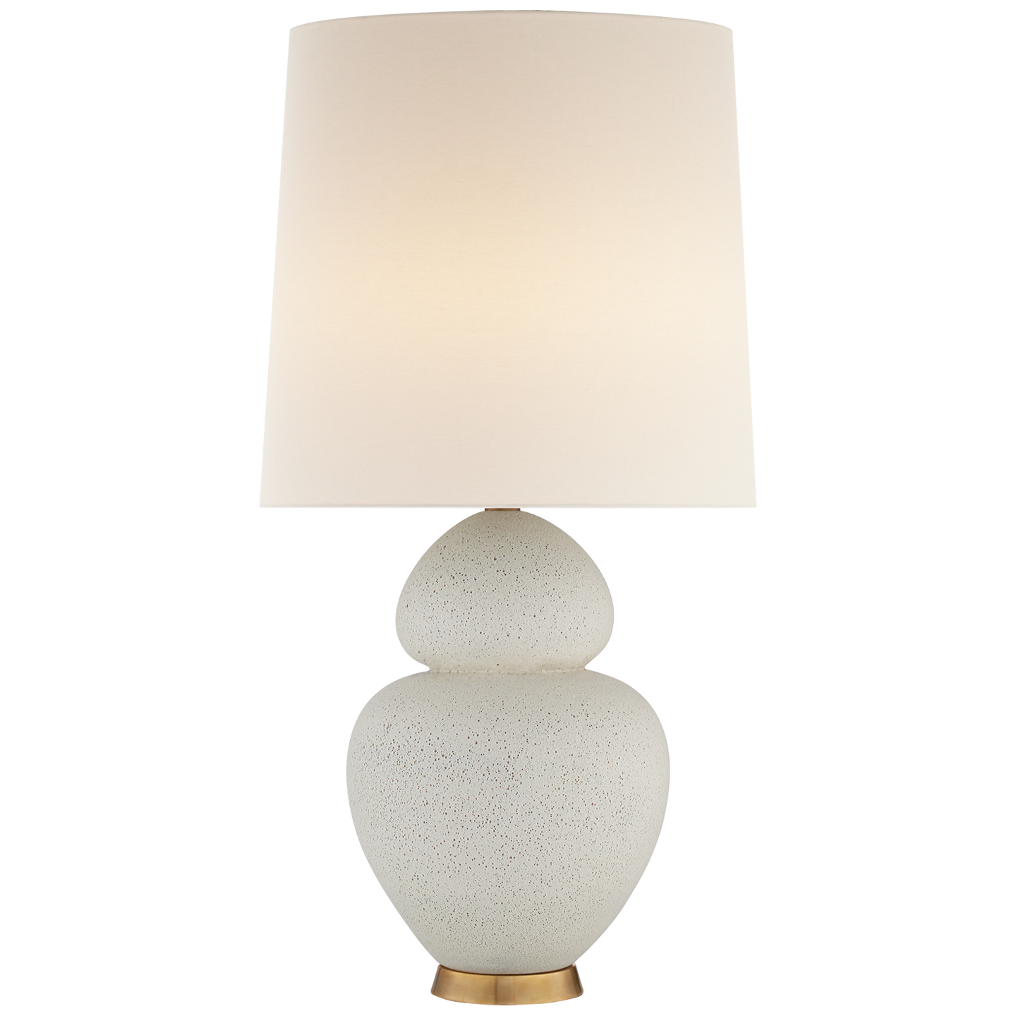 Visual Comfort's Michelena Chalk White Gourd Lamp with a gold accent, topped with a plain linen shade, on a striped table.