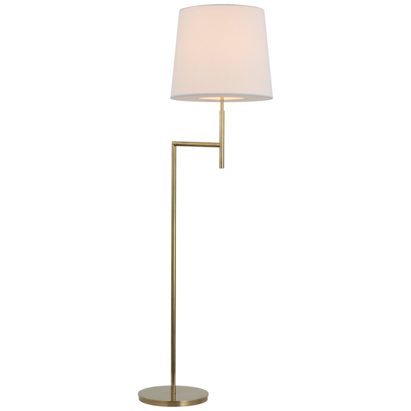 Visual Comfort's Clarion Bridge Arm Floor Lamp in Soft Brass with a sleek gold stand, a small rectangular side table, and a white linen shade, on a transparent background.