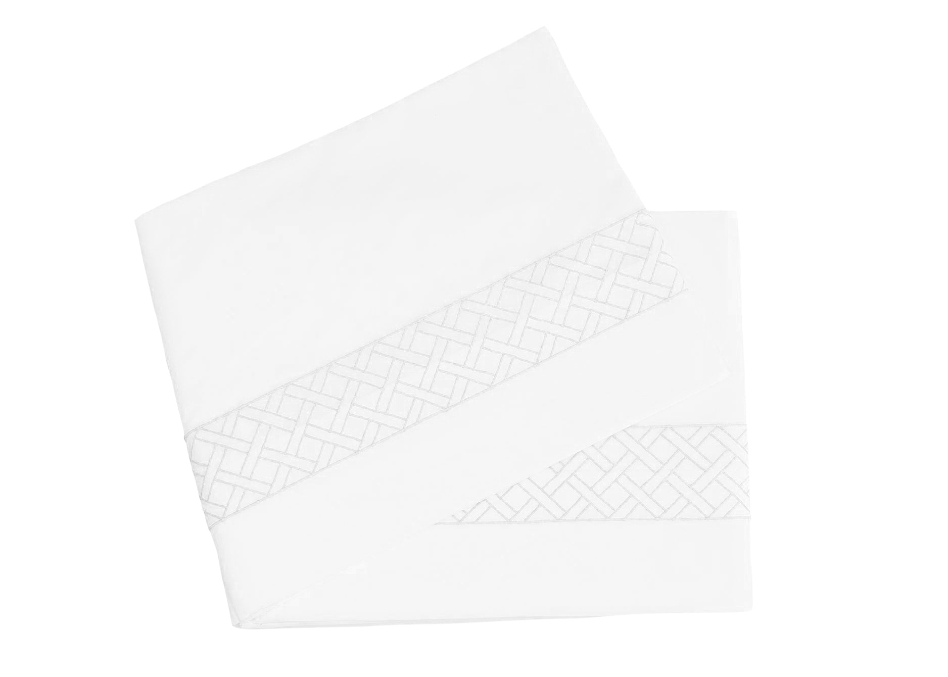 The HIVE Exclusive Rovella Bedding Collection by Matouk features white folded sheets with a subtle geometric lattice edge, crafted from luxurious Egyptian cotton percale and displayed on a plain white background.
