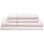 A neatly folded stack of the John Robshaw Poseti Lotus Sheet Set in light pink and white organic percale cotton, featuring a subtle decorative trim—an ideal layering essential for your bed.