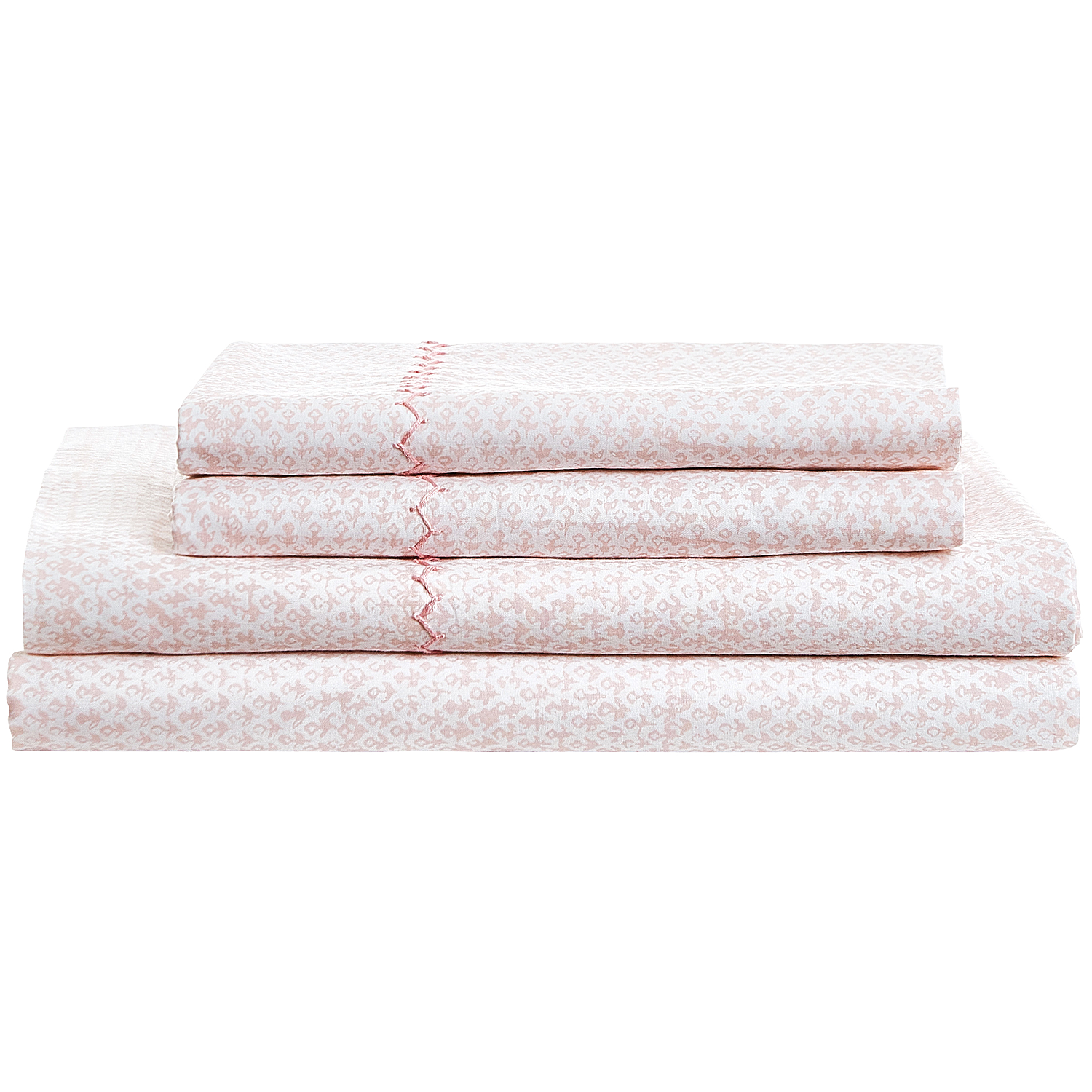 A neatly folded stack of the John Robshaw Poseti Lotus Sheet Set in light pink and white organic percale cotton, featuring a subtle decorative trim—an ideal layering essential for your bed.