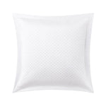 The Adagio Blanc Bedding Collection by Yves Delorme features a white square pillow in cotton sateen with a diamond quilted pattern and wide border, shown on a plain white background.