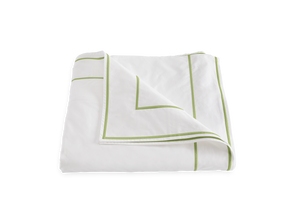 Matouk Ansonia Bedding Collection, Leaf duvet cover with green embroidered borders, folded and presented against a white background, made from OEKO-TEX Standard 100 certified Egyptian cotton percale.