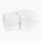 Two folded white Matouk Auberge Monogram Bath Towels, one showing an embossed "F", showcase timeless style—ideal for the guest bath. Displayed on a plain white background.