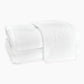 Two folded Matouk Auberge Monogram Bath Towels with a large embroidered "N" are displayed on a plain white background—ideal for the guest bath.