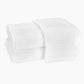 Two folded Matouk Auberge Monogram Bath Towels in white cotton terry, with an embroidered "S" on top, bring classic style to any guest bath. Set on a plain white background.