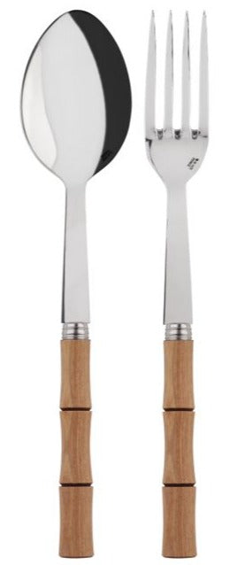 The Sabre Bamboo Serving Set, featuring a spoon and fork with stainless steel heads and natural wood handles, embodies the essence of fine serving cutlery.