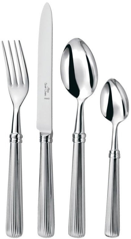 The Alain Saint Joanis Beatrix 5 Piece Flatware Set includes stainless steel fork, knife, tablespoon, teaspoon, and salad fork, each hand finished with a ribbed handle design and arranged side by side.