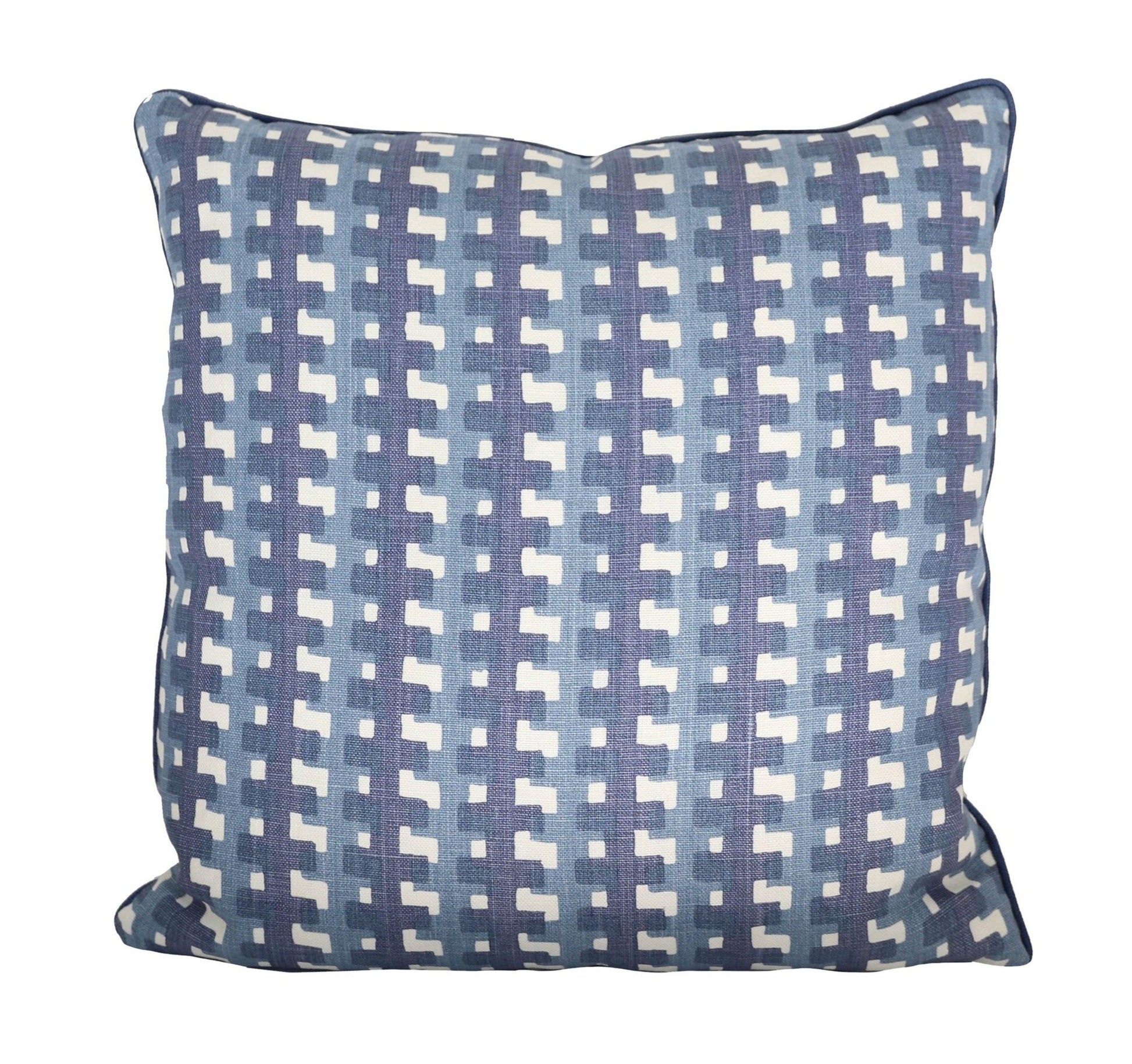 A Cremaillere Indigo Pillow handmade in the USA with a blue and white geometric pattern.