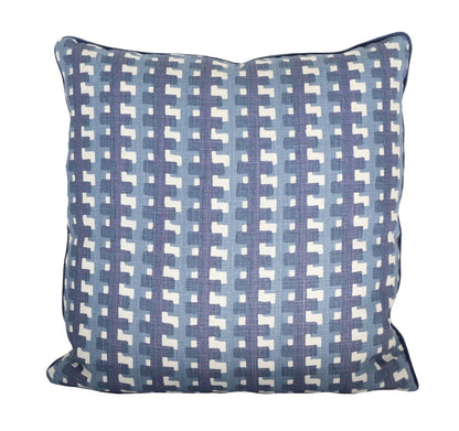 A Cremaillere Indigo Pillow handmade in the USA with a blue and white geometric pattern.