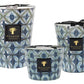 Three Baobab Collection Bohomania Kilan scented candles in varying sizes with a diamond pattern on blue and white glass containers.