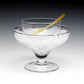 The William Yeoward Crystal Caspia Seafood and Caviar Server with Spoon features a small glass bowl set inside a larger ice-filled dish, ideal for elegantly serving caviar or a classic shrimp cocktail.