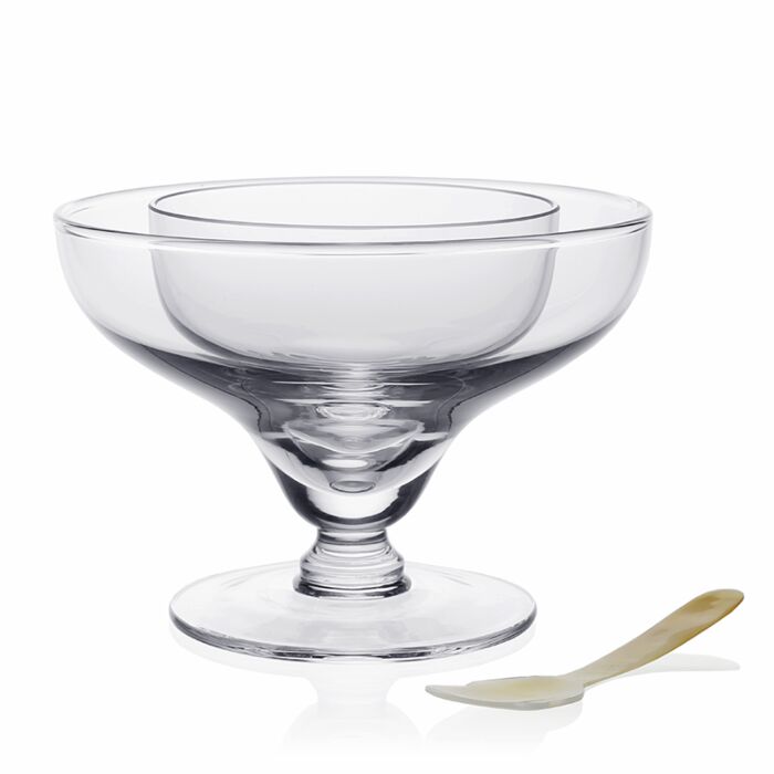 The William Yeoward Crystal Caspia Seafood and Caviar Server with Spoon features clear glass with a wide rim and short pedestal, perfect for shrimp cocktail or caviar, shown beside a small white spoon.