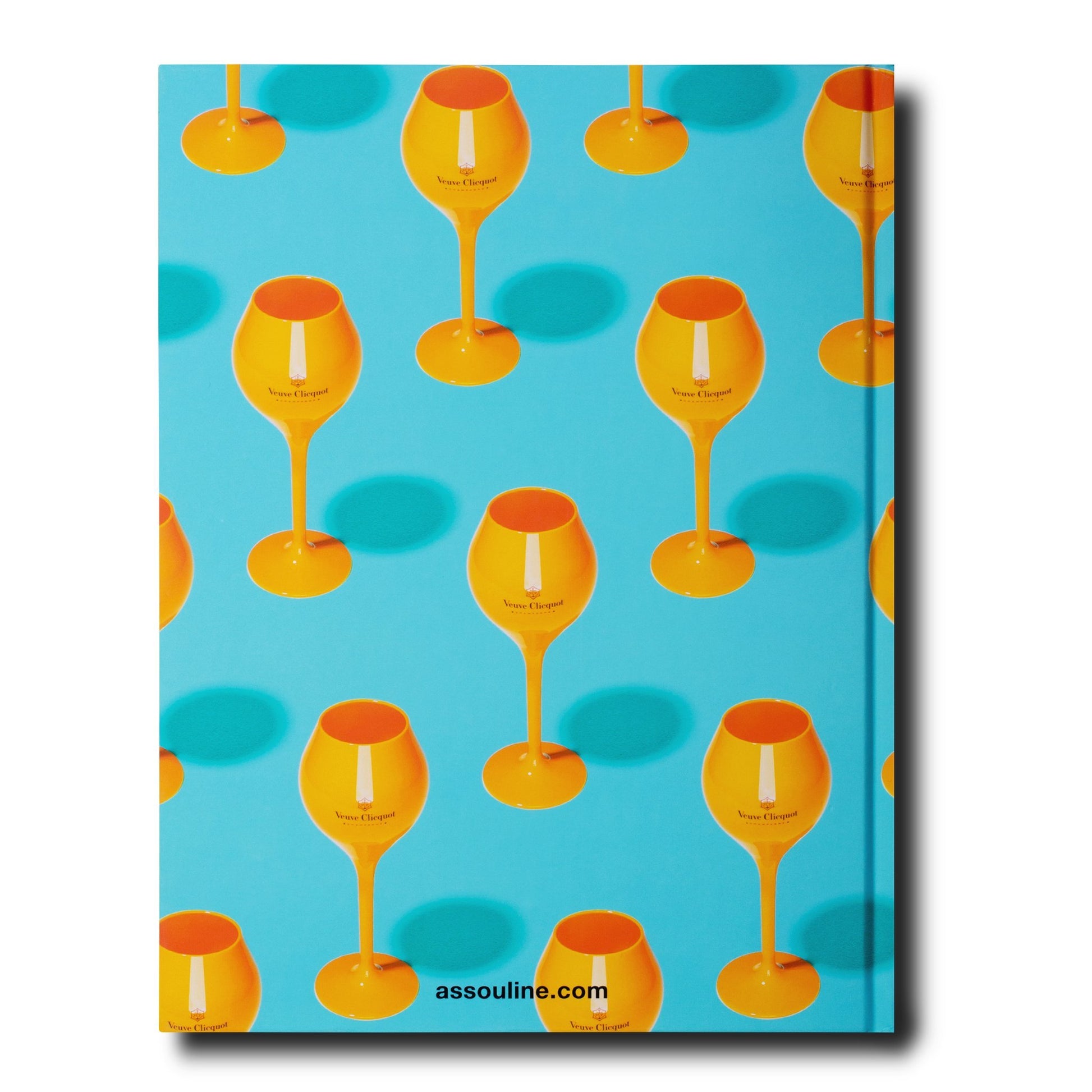 A book cover featuring an array of yellow wine glasses on a turquoise background, reminiscent of Assouline's vibrant style. The text "assouline.com" is at the bottom.