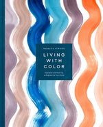 Book cover of "Living with Color" by Penguin Random House, showing wavy vertical stripes in blue, peach, lavender, and white—ideal inspiration for your home decor palette.