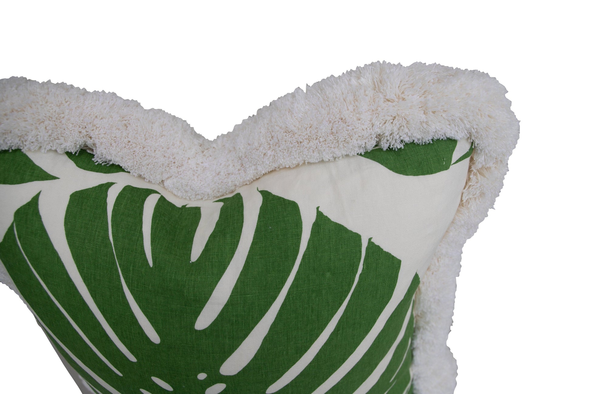 The Exoticus Elephant Leaf Pillow by Hive Custom Pillows features a green leaf design with a thick, white, fluffy border, displayed against a plain white background.