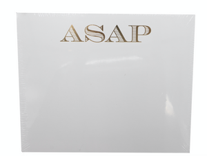 The Black Ink ASAP Large Notepad is made of premium white cardstock and showcases “ASAP” in large, gold foil lettering at the top center.