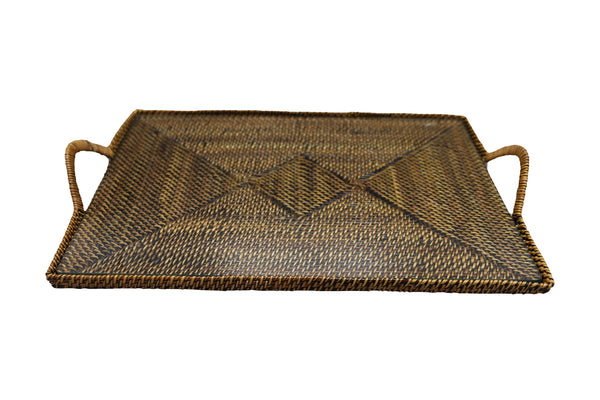 Handmade woven rectangular tray with side handles and glass on a white background by Calaisio.
