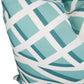 A close-up of the Treillage Bleu Outdoor Pillow by Associated Design, handmade in the USA, showcasing a white and teal geometric pattern with intersecting lines and shapes.