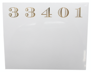 The Black Ink 33401 Large Notepad features gold numbers "33401" on a white square, adding a touch of elegance to your desk—perfect to use with a Lucite Notepad Holder or premium note paper.
