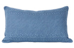 The Indigo Jacinto Pillow by Hive Custom Pillows is a rectangular, blue, double-sided pillow with a geometric white pattern of diagonal lines and diamond shapes on a plain white background.