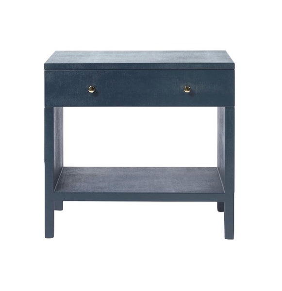 A Maris Nightstand, Navy with two drawers, made of faux Belgian linen, made by Made Goods.