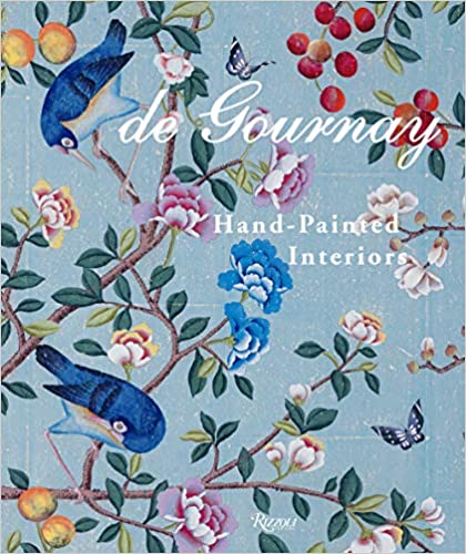 Book cover of "Common Ground: Hand-Painted Interiors" featuring chinoiserie wallpapers with ornate floral designs, birds, and butterflies on a blue background.