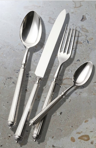 The Alain Saint Joanis Lignes 5 Piece Silver Plated Flatware Set, showcasing quality craftsmanship, is displayed on a light gray stone-textured surface.